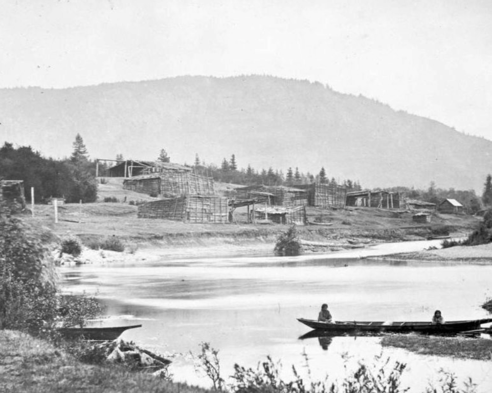 The Quamichan [Hul’qumi’num] Village. Vancouver Island, East Coast. Possibly the village of Kw’amutsun on the Cowichan River.