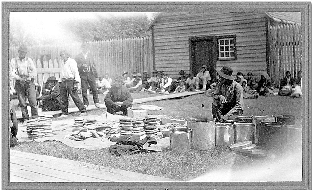 Preparing the feast to be held after the James Bay Treaty signing ceremony, Osanaburgh House.